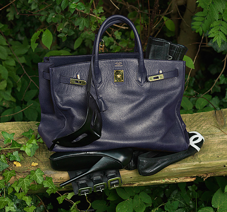 Hermés Birkin bag, Chanel ballet flats, and leather corset